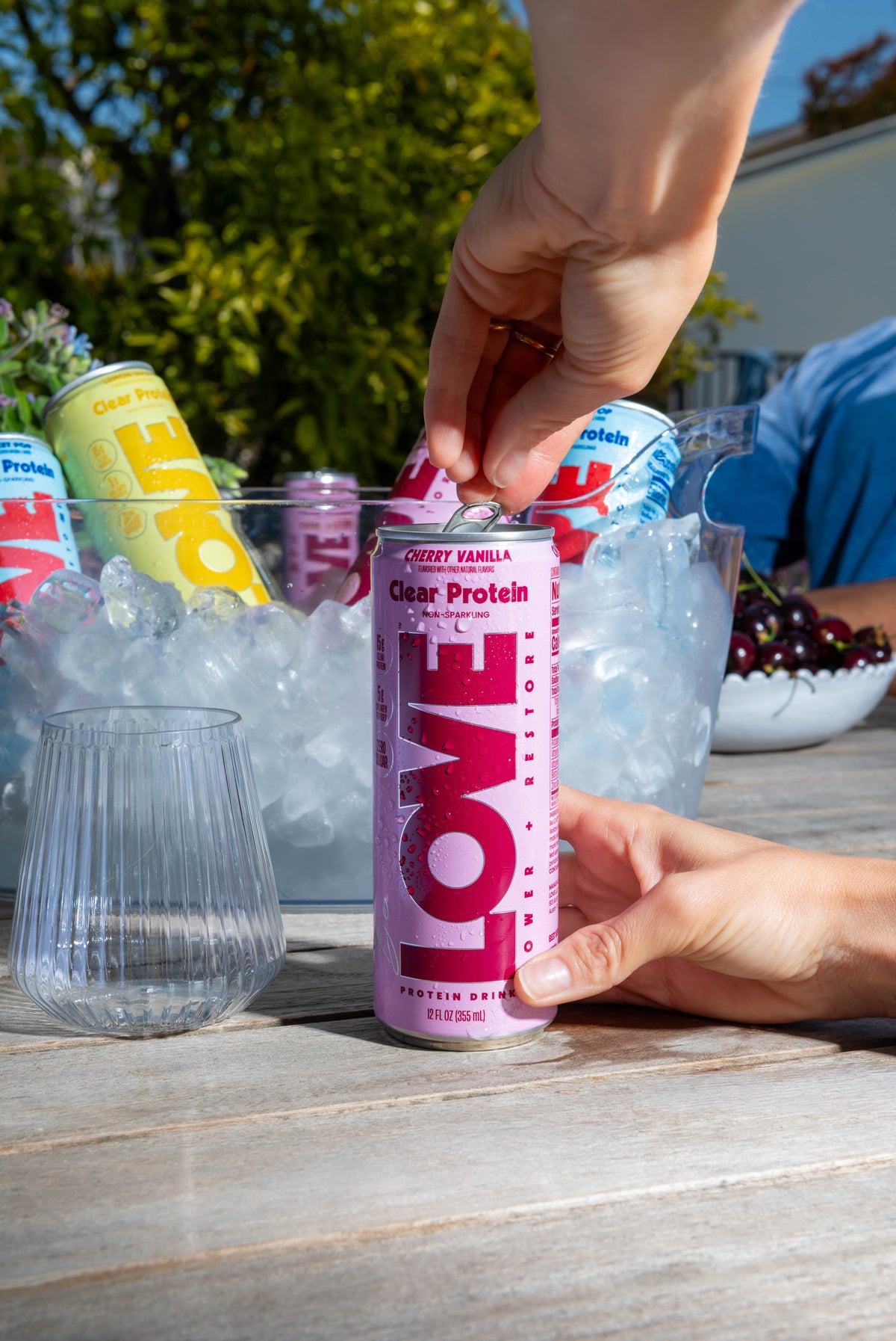 Cherry Vanilla LOVE clear protein can opened over ice